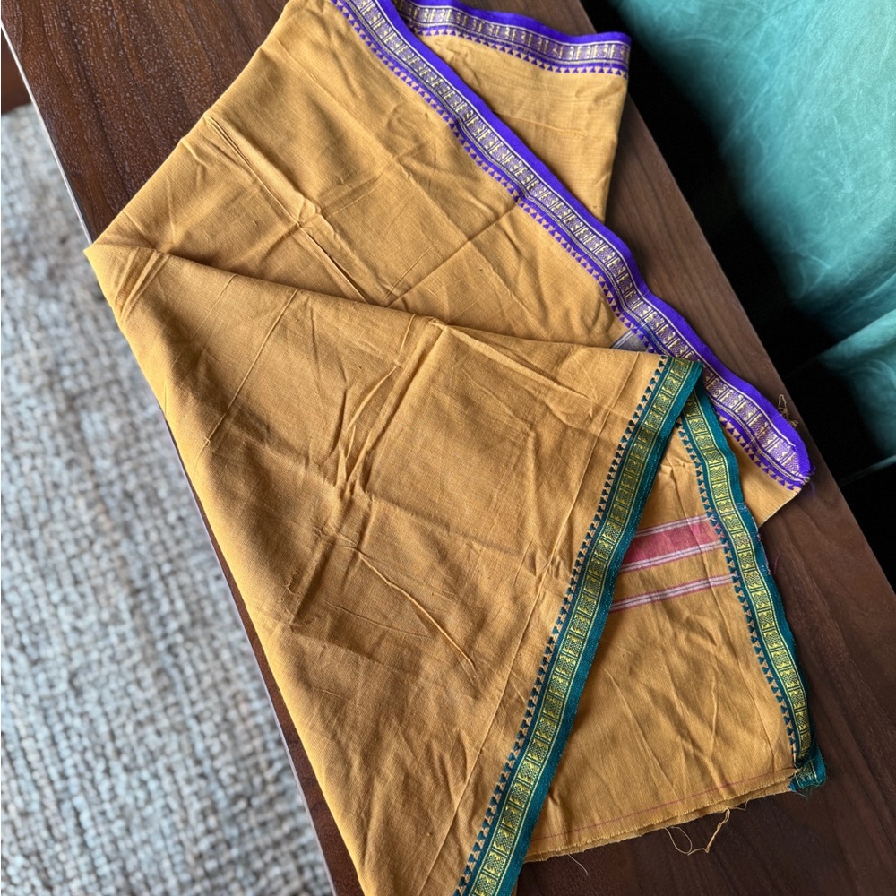 Vibrant Yellow Fabric with Purple and Green Trim